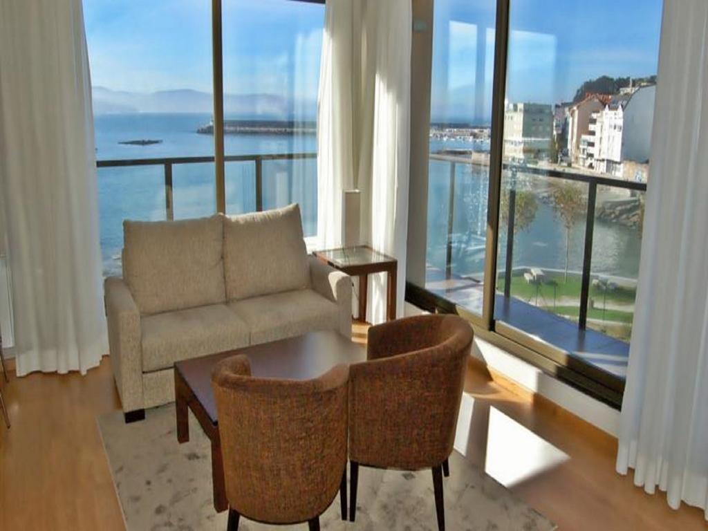 Apartamentos Turisticos Playa De Osmo Corme 외부 사진
