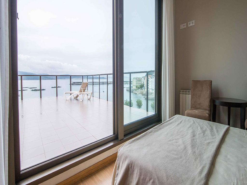 Apartamentos Turisticos Playa De Osmo Corme 외부 사진