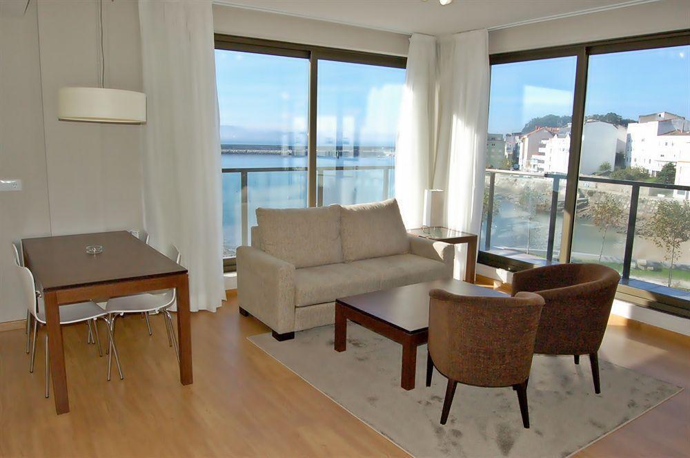 Apartamentos Turisticos Playa De Osmo Corme 외부 사진