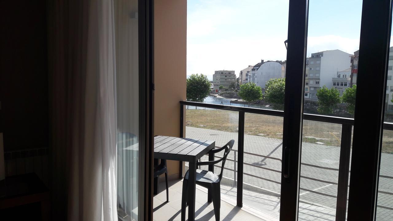Apartamentos Turisticos Playa De Osmo Corme 외부 사진